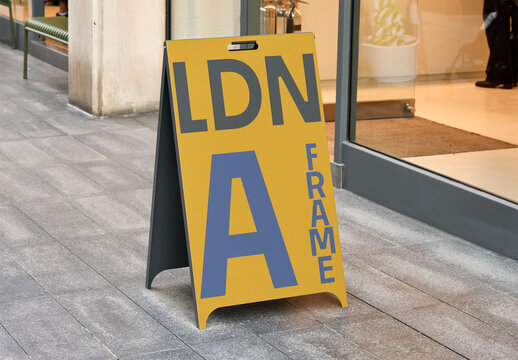 Real photo of A-frame sidewalk sign in London. PSD template Mockup.
