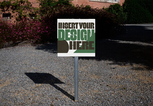Real photo of Empty Sign Stands Alone in the Garden. PSD mockup.