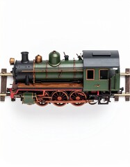 Fototapeta premium Vintage Model Train Engine on White Background for Hobby and Collection Concepts.