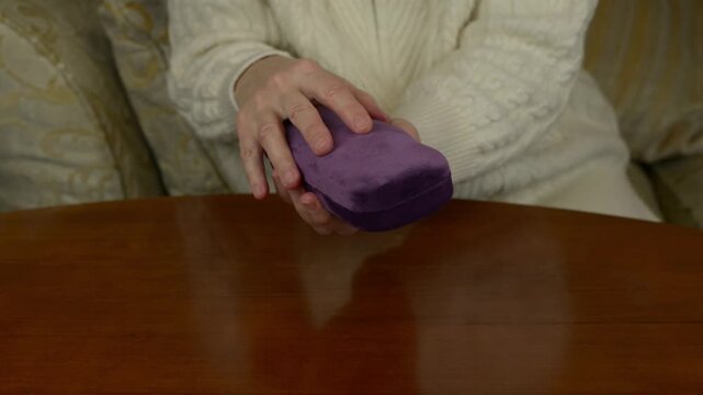 Opening and closing a elegant hard eyeglass case with a loud mechanical snap while hitting hard, tactile sound