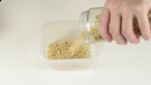 Filling Plastic Container With Uncooked Rice Grains with Sound