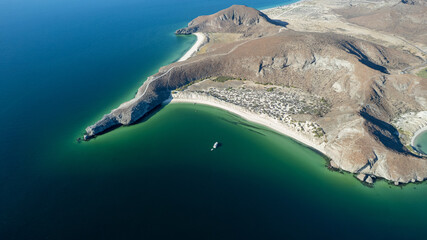 Fototapeta premium Aerial View of Balandra Beach with Turquoise Waters in La Paz, Baja California Sur, Mexico