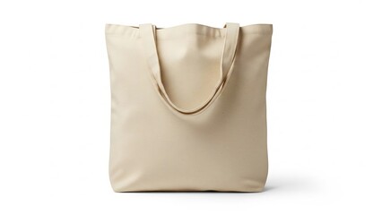Obraz premium Simple beige canvas tote bag isolated on white background, perfect for shopping and carrying items.