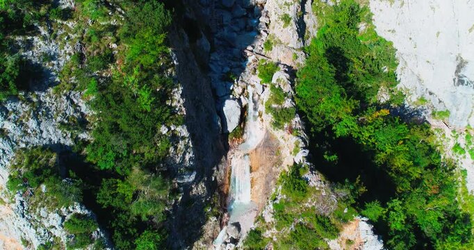 Vertical canyon waterfall aerial