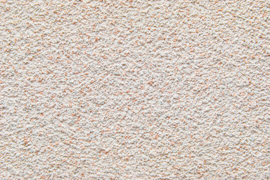 Beige decorative flakes wall texture or pattern