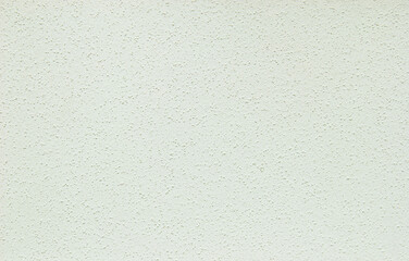 Ivory plastered dry wall texture, light rough chips dry wall texture as background