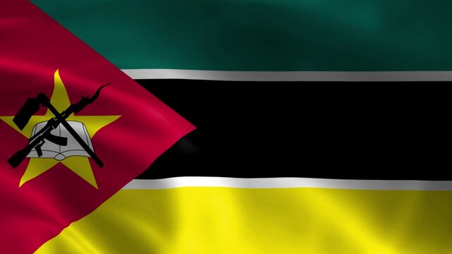 Flag of Mozambique waving in the wind national symbol with emblem of book hoe and AK-47 representing history and independence isolated on white background