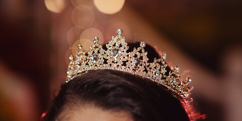 Young woman with princess crown © Marco