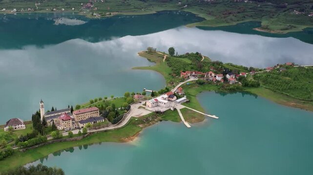 Aerial shot of bridge across lake