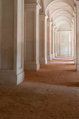 Clean long corridor perspective. Antique building, classic columns, minimalist interior.