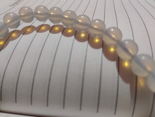 Opal beads in the paper