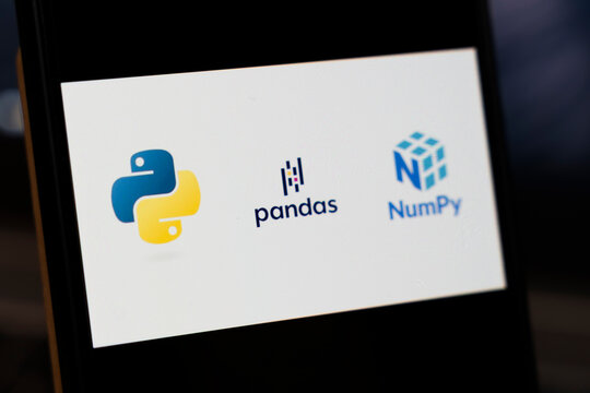 Warsaw, Poland - Feb 10, 2026: Close-up of popular programming logos including Python, Pandas, and NumPy displayed on a device screen, showcasing their prominence in data science.