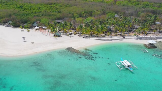 Drone view of tropical beach boats