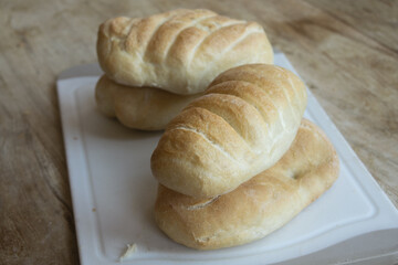  Freshly baked italian schiacciata bread on cutting board © sal