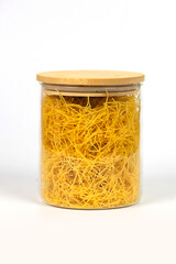 Italian Pasta, penne rigate, in a glass jar