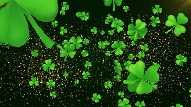 St Patricks day celebration background with green clover and sparkling gold particles