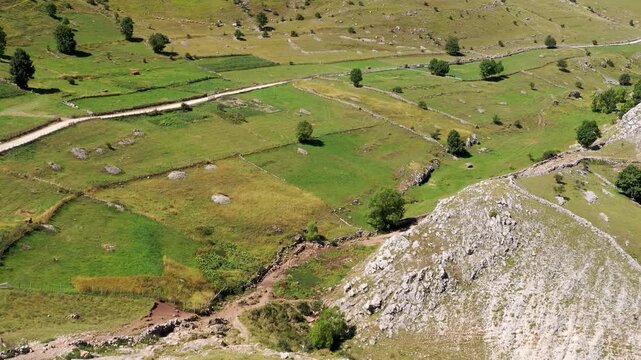 Aerial view of mountain pasture landscape