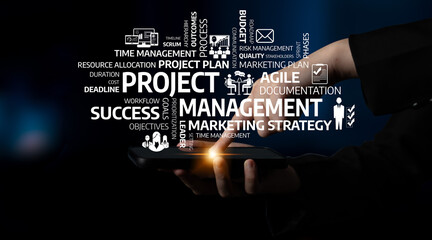 A close-up view of hands using a tablet, showcasing key concepts in project management and...