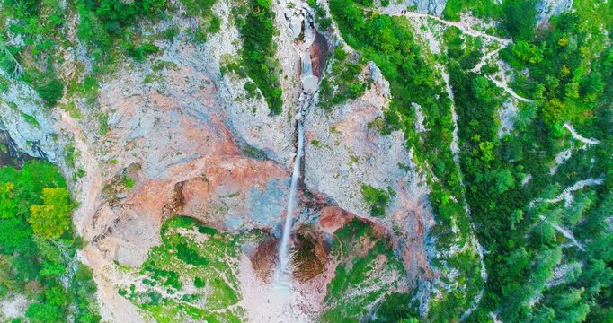Vertical drone shot of Rinka waterfall cliff
