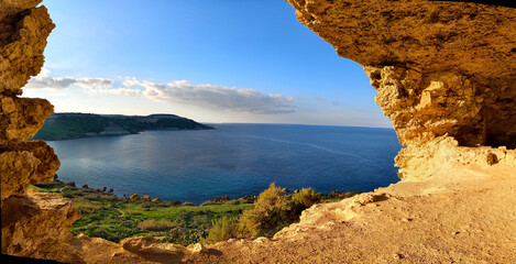 View from Tal-Mixta Cave near Nadur overlooking the Gozo coastline and open sea