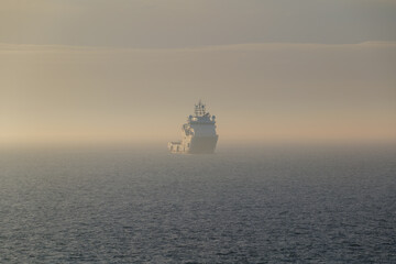 A foggy ship at sea © Adam Sadlak