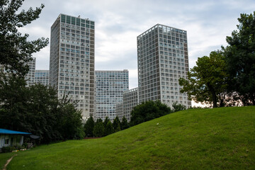 Modern Tall Buildings and Green Park in City © Nguyen