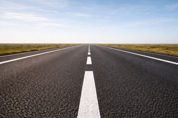 Naklejka premium Centered Road Lines Perspective Illustrating Direction, Journey and Clear Path Concept, Symmetrical Asphalt Composition, Alignment, Focus, Movement Theme, Clean Modern Background with Copy Space