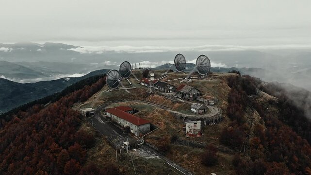 Abandoned Cold War Communication Station in the Fog