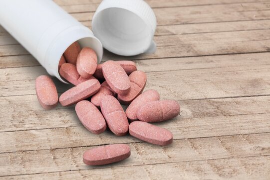 Plastic bottle on a with pills, healthy diet concept