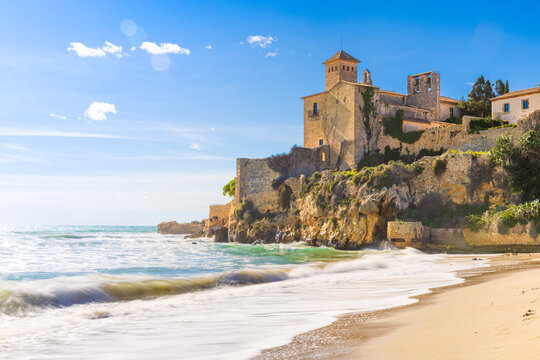 Tamarit Castle on the Mediterranean coast with beach. Tarragona, Spain.