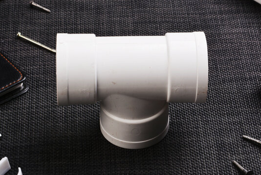 White PVC Drainage Pipe Tee Connector - Plumbing Fixture