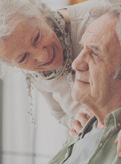 Elderly couple supporting each other