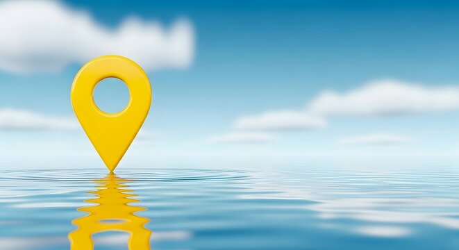 A bright yellow location pin standing in calm water with a blue sky and white clouds in the background on a sunny day