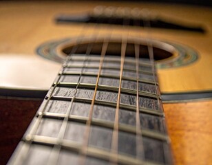 Macro shot of acoustic guitar strings and wooden fretboard with warm ambient lighting
