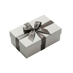 Fototapeta premium pristine light beige rectangular gift box wrapped with dark grey satin ribbon and neat bow, on a white pedestal against gray background. concept of luxurious refined gift presentation