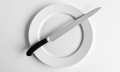 Anticipation of the Feast: A Serving Knife Resting on a Plate