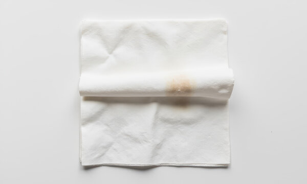 A Memory of a Meal: A Folded Napkin with a Single Stain