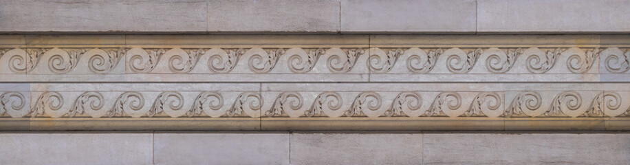 Elements of architectural decorations of buildings, columns and capitals, gypsum moldings, wall textures and patterns. On the streets in Barcelona, public places. © Kozlik_mozlik