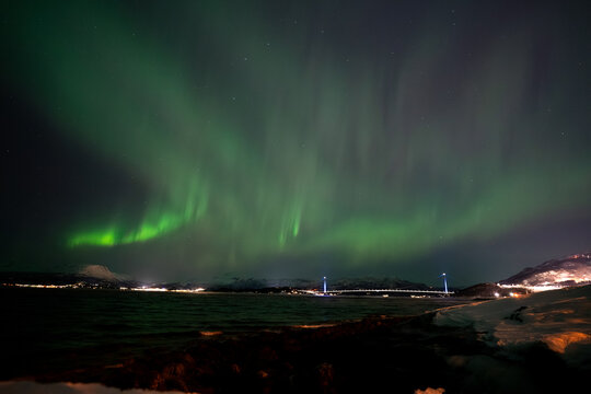 Aurora Borealis in the night sky above the H&aring;logaland Bridge near Narvik, Norway