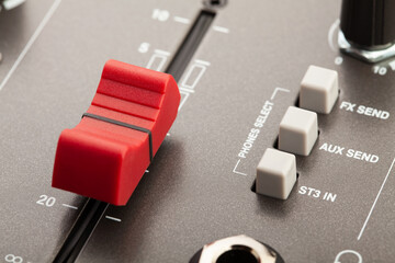 recording mixer main fader closeup