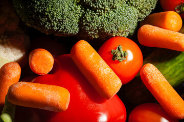 baby carrots vegetable mix on black background