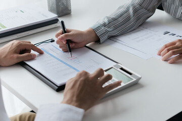 Professional accountant analyzing documents in office for precise valuation