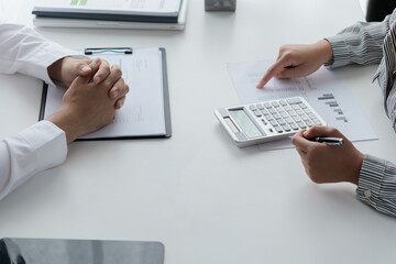 Professional accountant analyzing documents in office for precise valuation