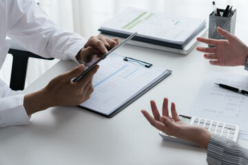 Professional accountant analyzing documents in office for precise valuation