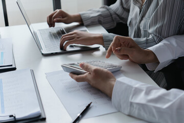 Accountant assessing numbers in office for precise valuation documents