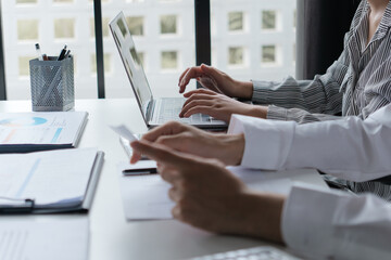 Professional accountant analyzing documents in office for precise valuation