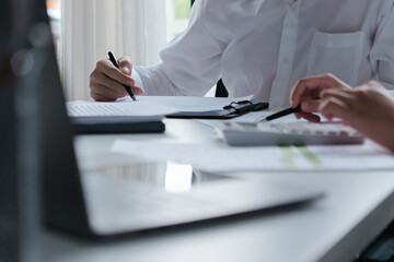 Accountant assessing numbers in office for precise valuation documents