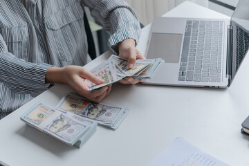 hands counting dollar bills, business finance and economy concept