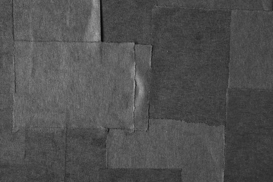 Black paper texture close-up, abstract background