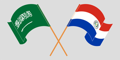 Crossed and waving flags of Saudi Arabia and Republic of Paraguay. Vector illustration